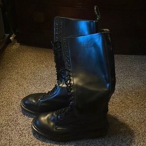 Knee high Dr.Marten boots.